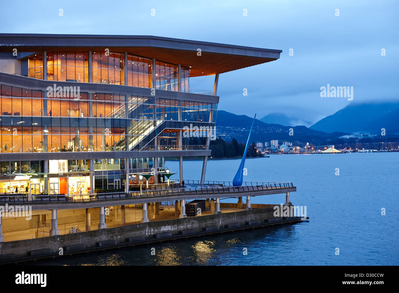 late evening at the Vancouver convention centre west building on burrard inlet BC Canada Stock Photo