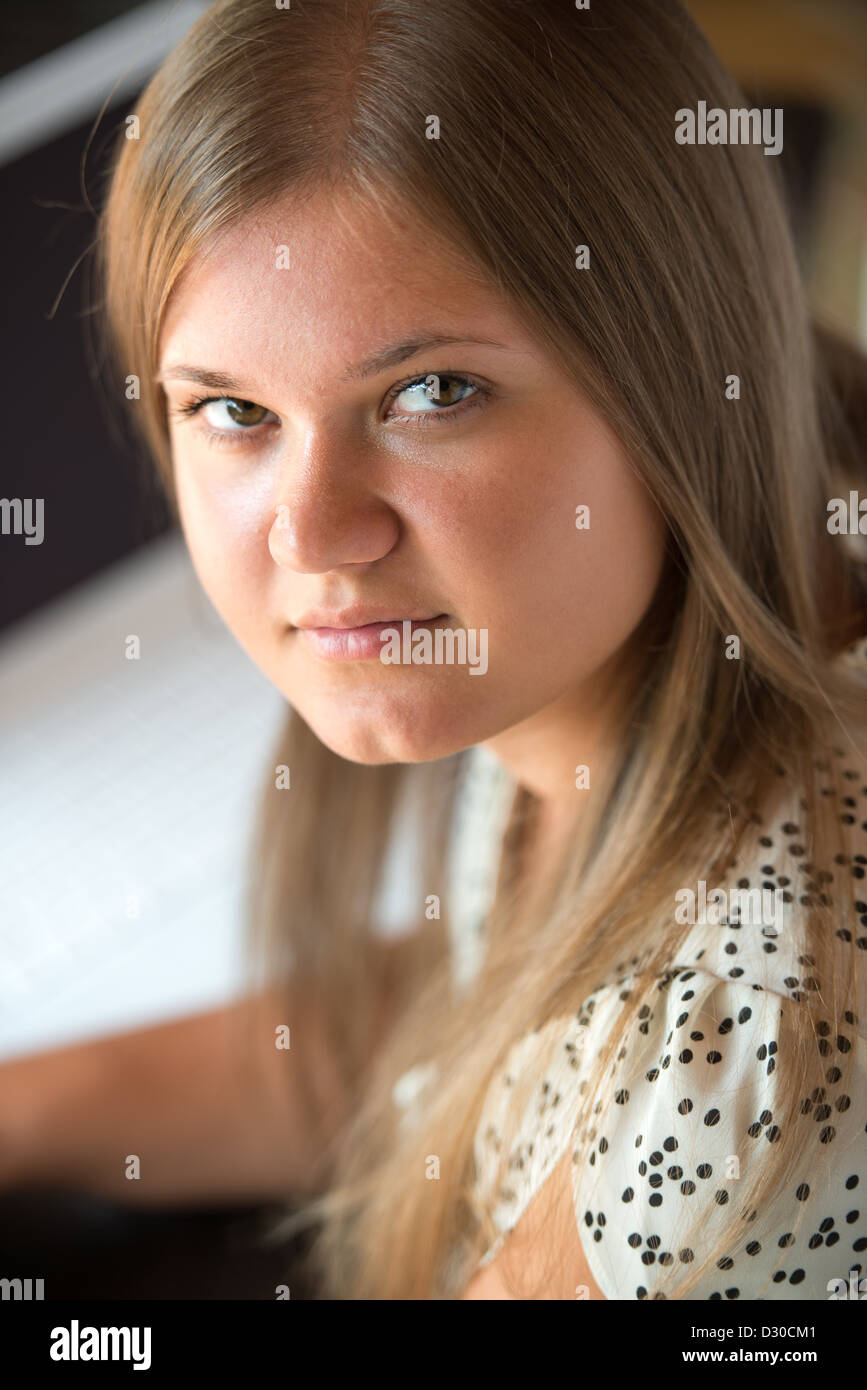 pretty blond girl with white laptop computer Stock Photo