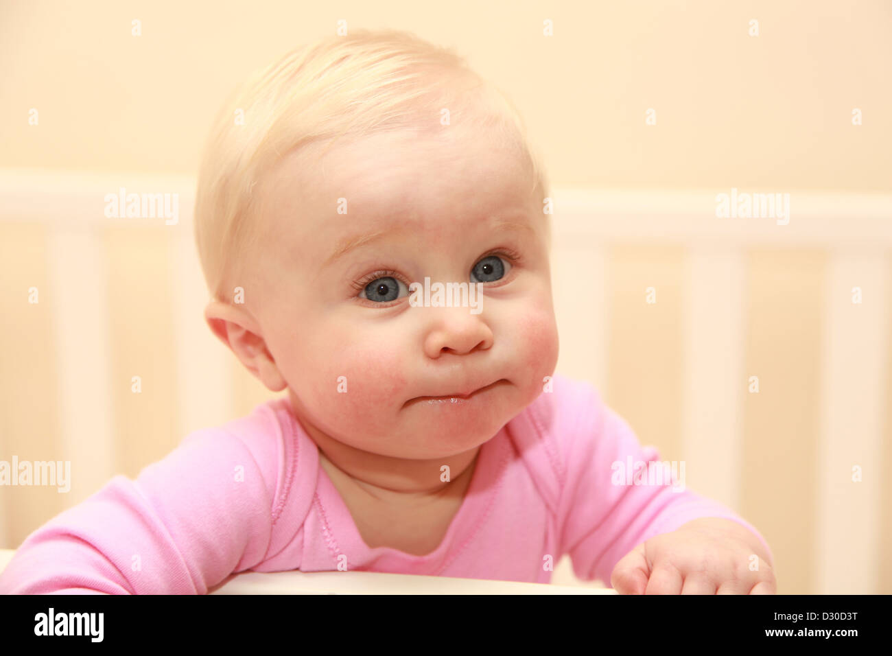 Baby girl in cot not sleeping due to teething Stock Photo Alamy