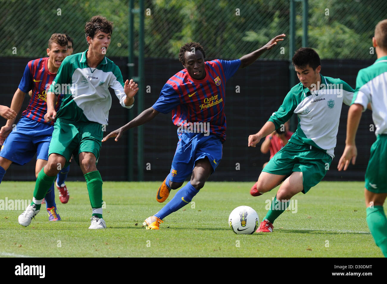 BARCELONA, SPAIN - SEP 4: Ebwelle plays with F.C Barcelona youth team against U.E. Cornella. Stock Photo