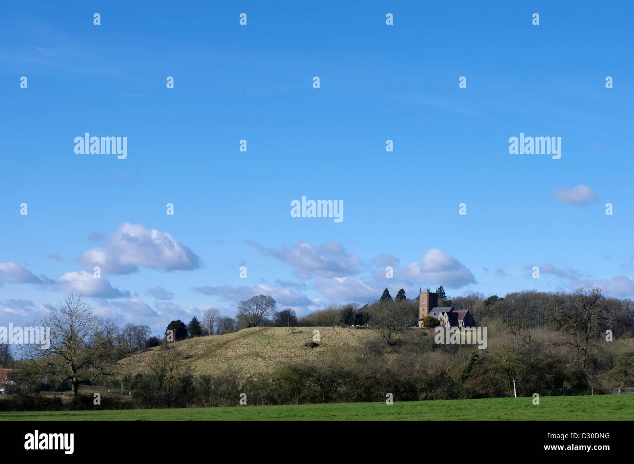 Church on a hill with space above Stock Photo