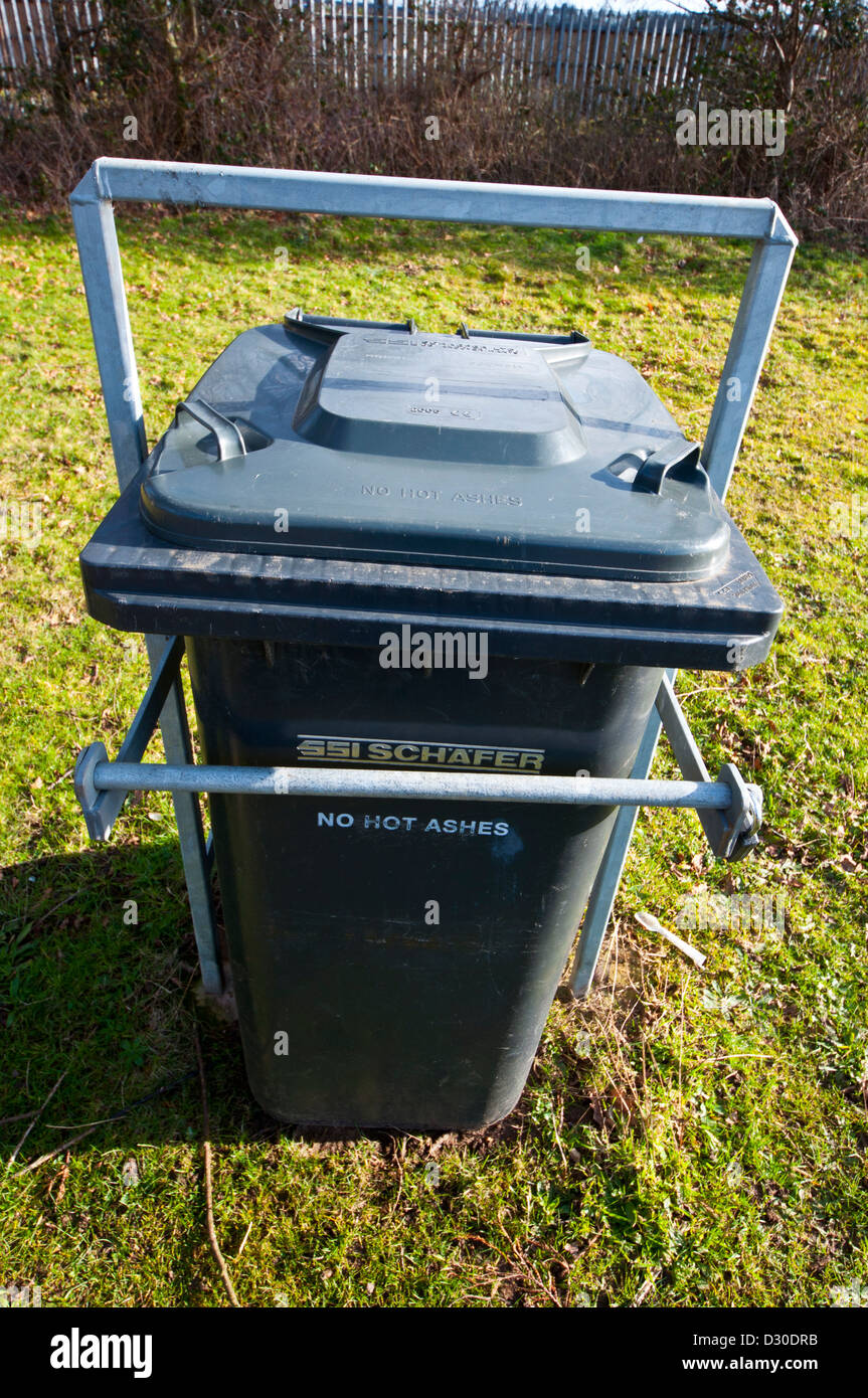 Locked wheelie bin used as litter bin Stock Photo Alamy