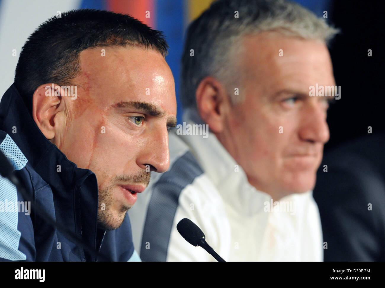 Paris, France. 5th February 2013. France's head coach Didier Deschamps and player Franck Ribery take part in a press conference held by the French national soccer team at the Stade de France in Paris, France, 05 February 2013. German will play France on 06 February 2013. Photo: ANDREAS GEBERT/dpa/Alamy Live News Stock Photo