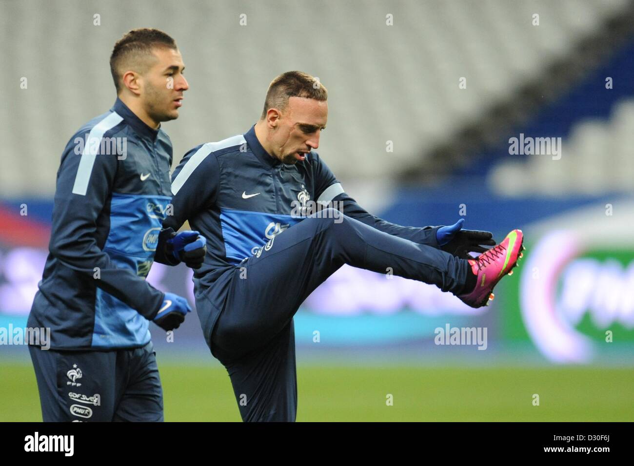 Paris, France. 5th February 2013. France's Karim Benzema (L) and Franck Ribery takes part in French national soccer team practice at the Stade de France in Paris, France, 05 February 2013. German will play France on 06 February 2013. Photo: ANDREAS GEBERT/dpa/Alamy Live News Stock Photo