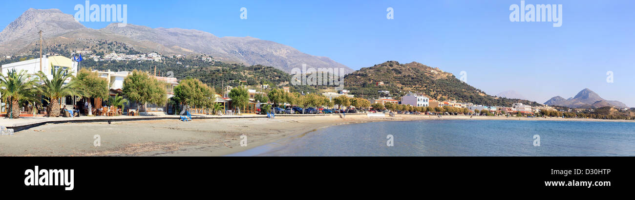 A panoramic view of the beach at Plakias on the south coast of Crete and its surrounding mountains. Stock Photo