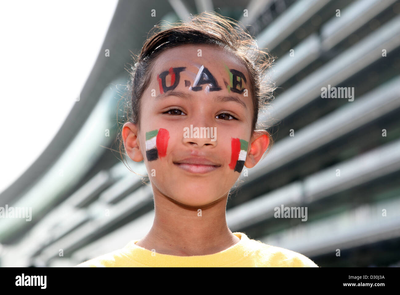 Dubai, United Arab Emirates, girls with face paint in the national