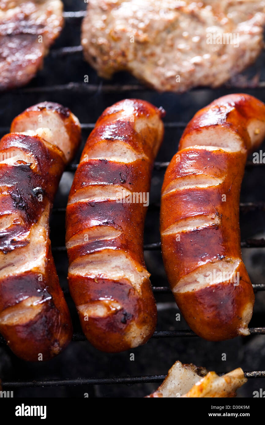 Closeup of meat on grill Stock Photo - Alamy