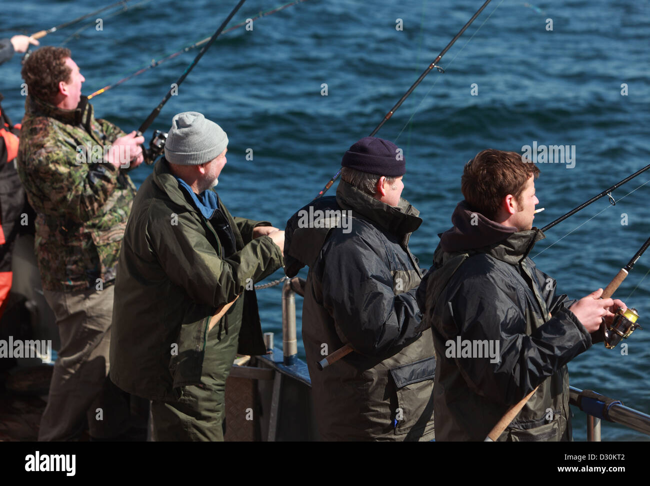 Wismar, Germany, Men in Big Game Fishing in the Baltic Sea Stock Photo