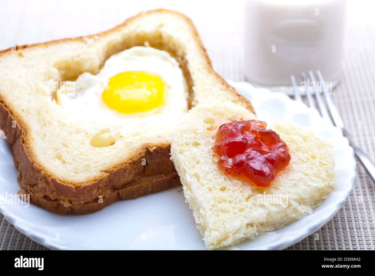 Breakfast - heart shaped bread and egg Stock Photo - Alamy