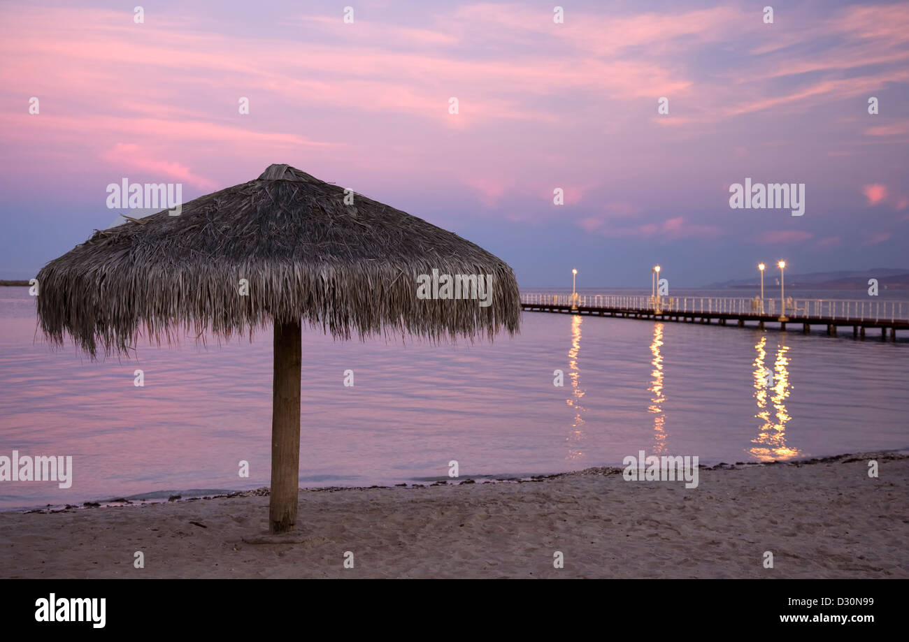 Palapa and pier at sunrise, Malecon (boardwalk), La Paz, Baja California Sur, Mexico Stock Photo