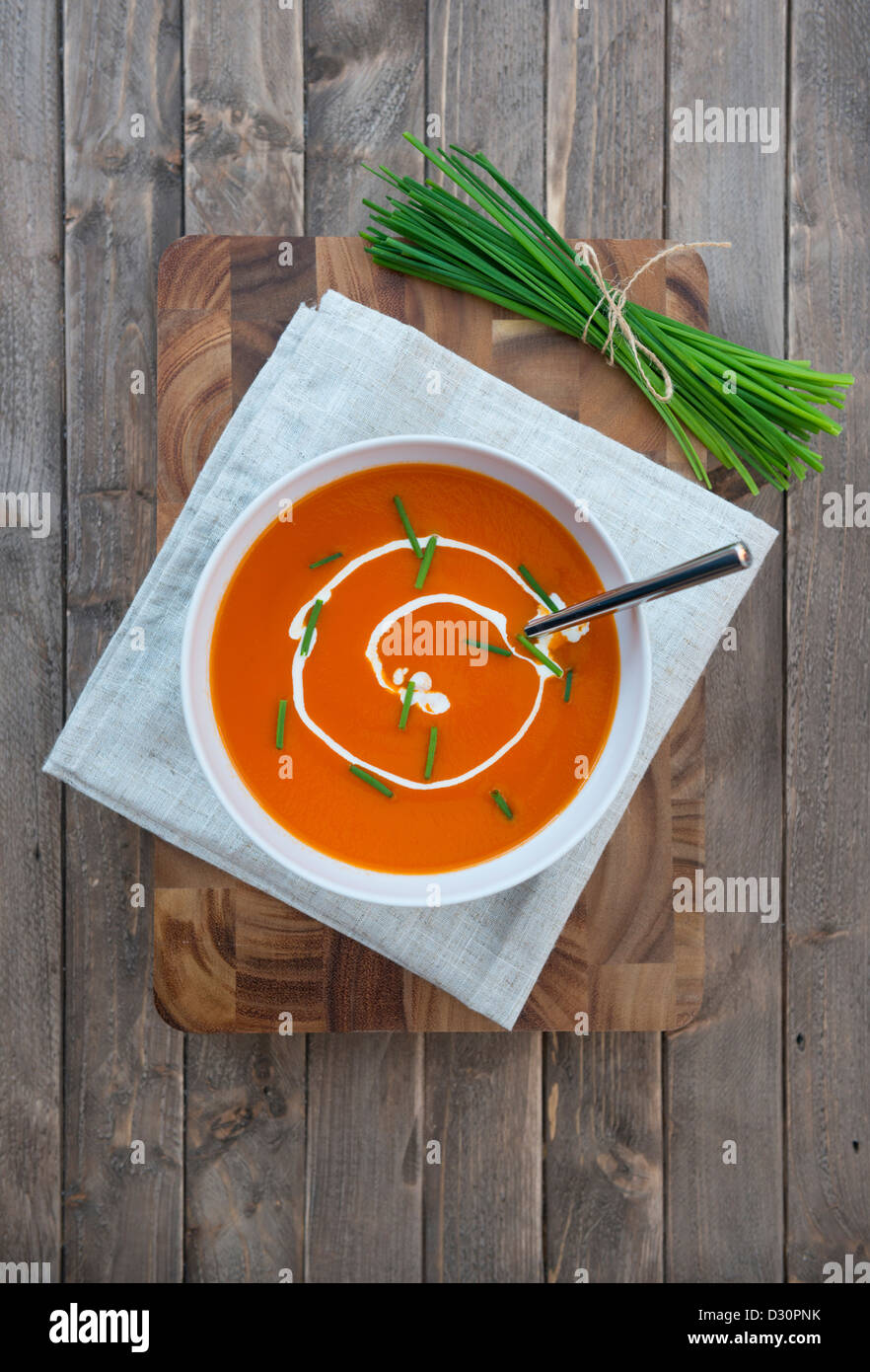 Cream of Tomato Soup, with chives. Stock Photo