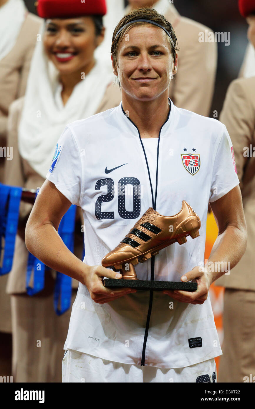 Abby Wambach of the United States holds her adidas Golden Boot award after the USA was defeated by Japan in the World Cup final. Stock Photo