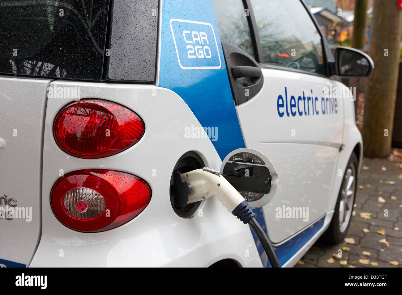 car sharing car2go electric car charging at a parking spot in Vancouver