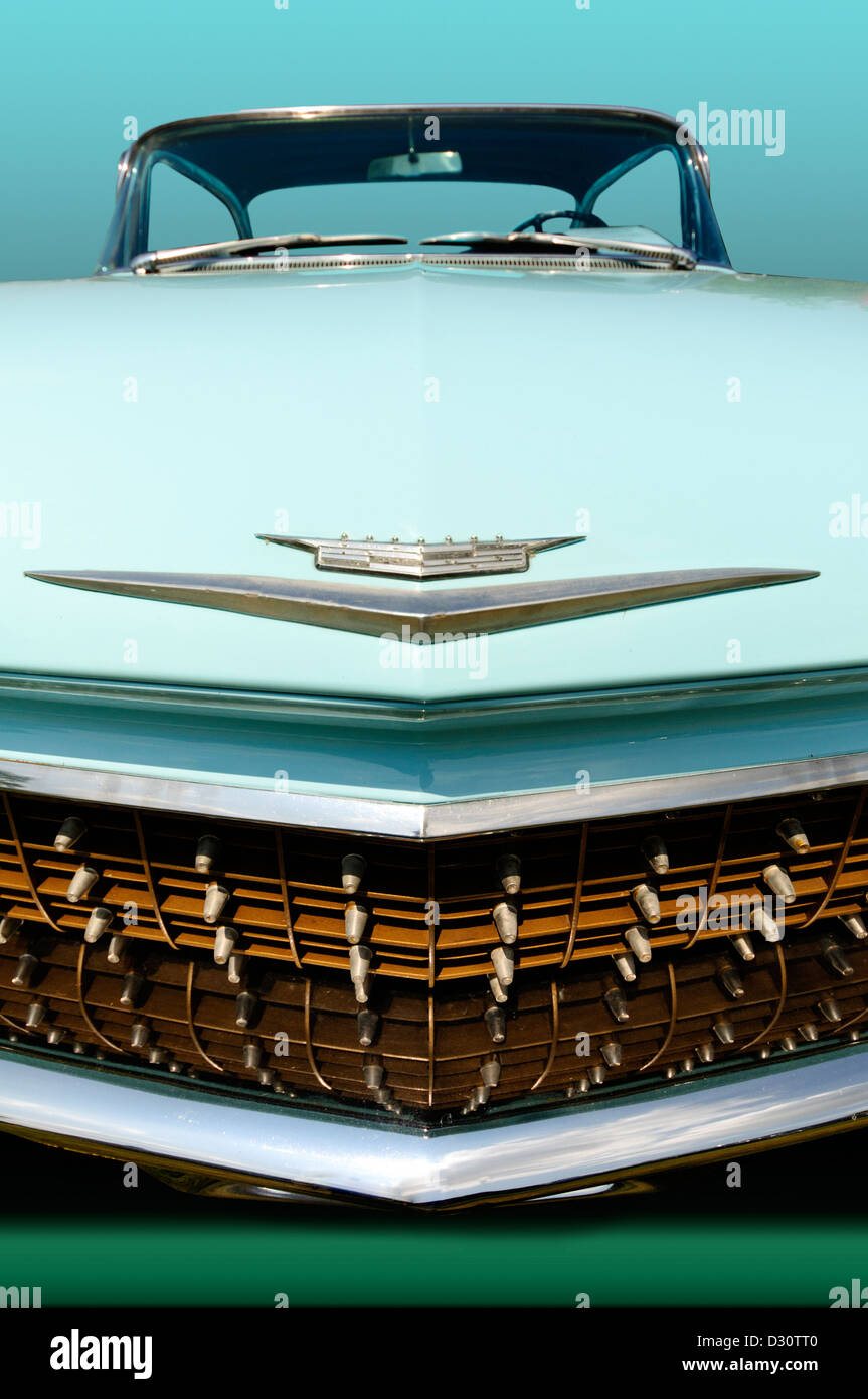 Close up view of the front of a 1960 Cadillac with neutral background Stock Photo