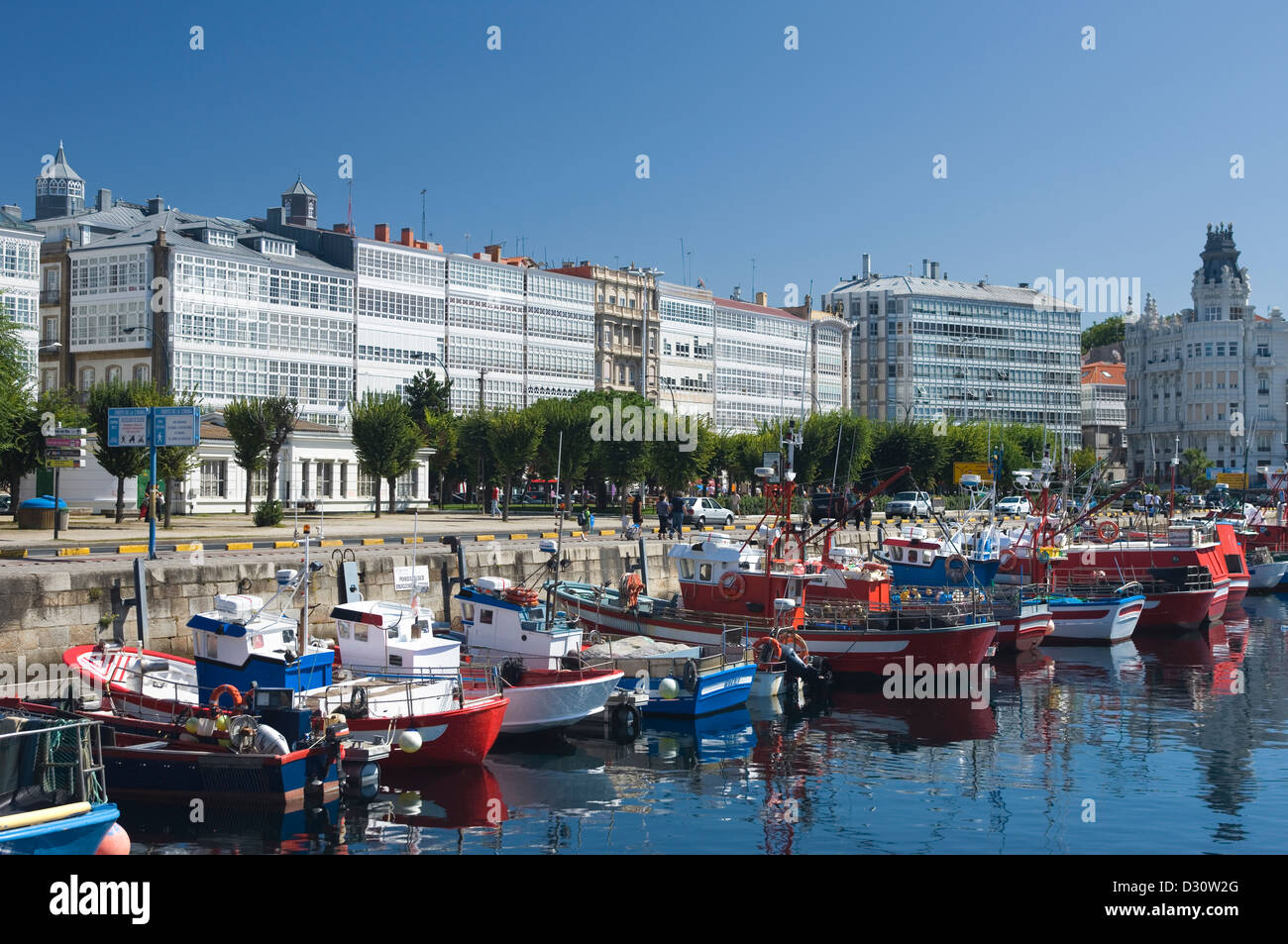 FISHING BOATS IN HARBOR AVENIDA DA MARINA LA CORUNA GALICIA SPAIN Stock Photo