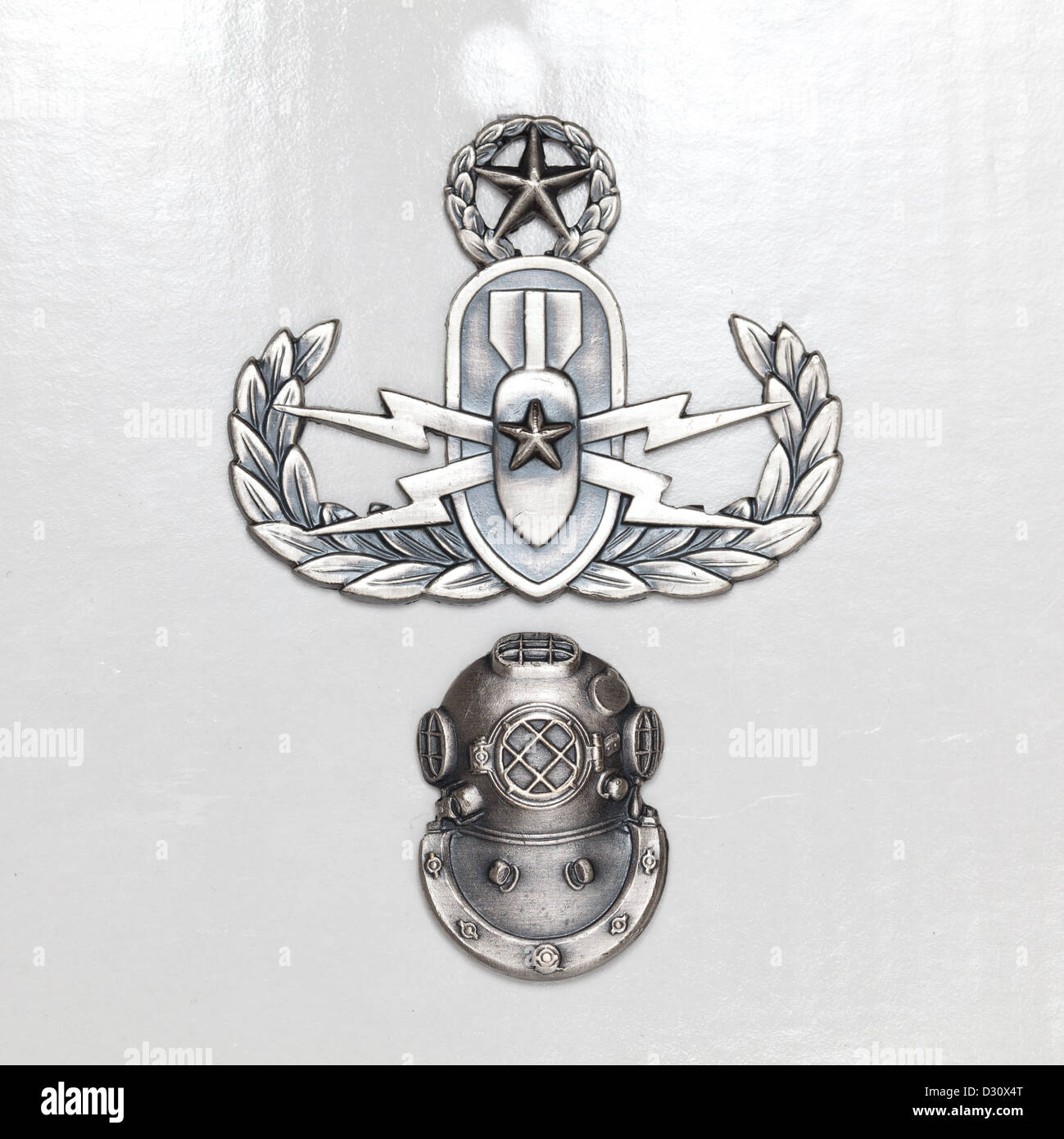 Master Explosive Ordnance Disposal (EOD) badge over 2nd Class Diver badge Stock Photo