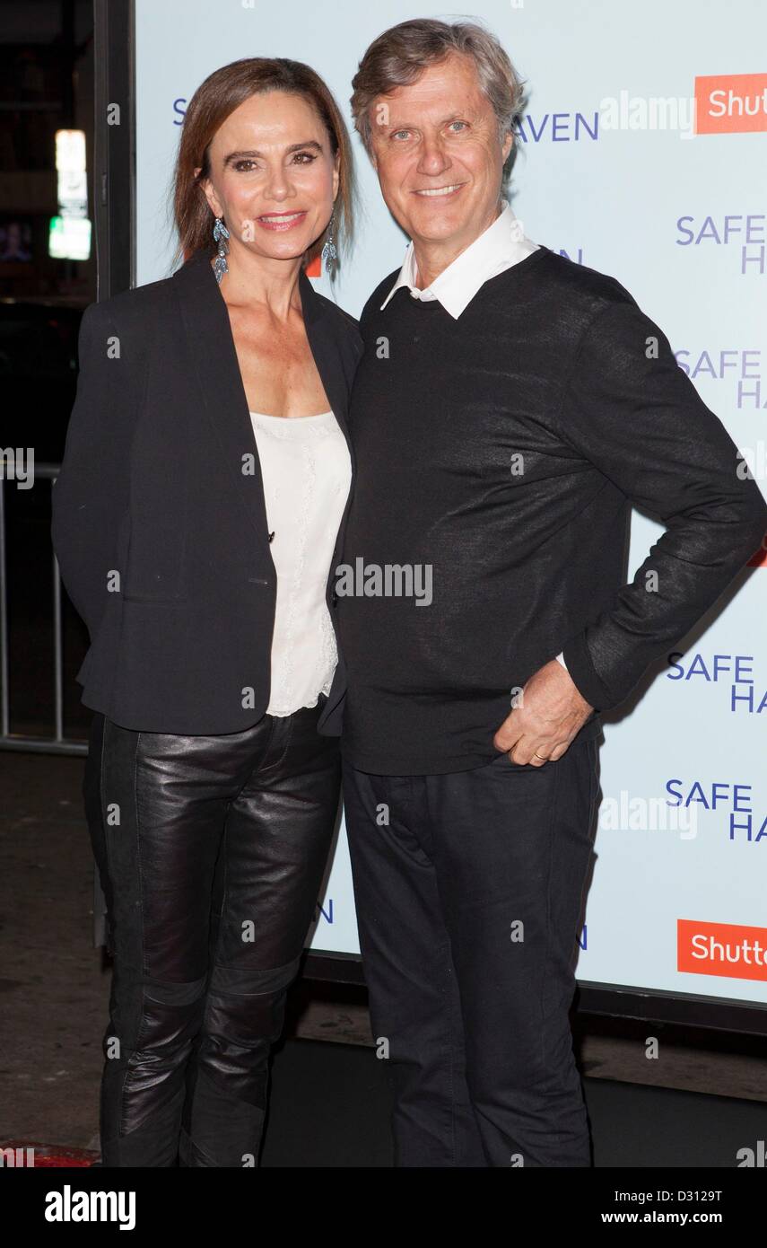 Lena Olin, Lasse Hallstrom at arrivals for SAFE HAVEN Premiere, Grauman's Chinese Theatre, Los Angeles, CA February 5, 2013. Photo By: Emiley Schweich/Everett Collection Stock Photo