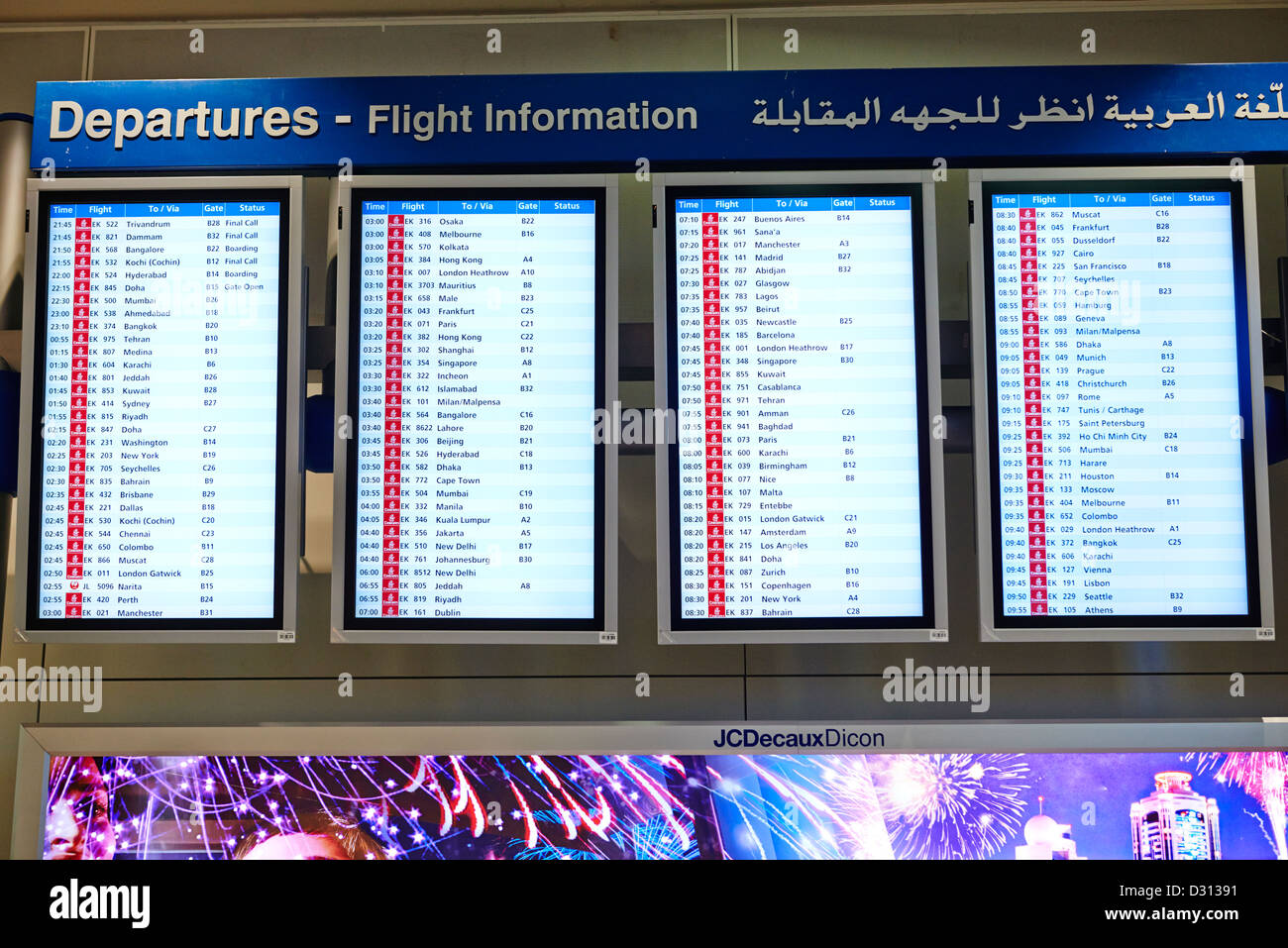 The flight information departure display at the terminal of the Dubai