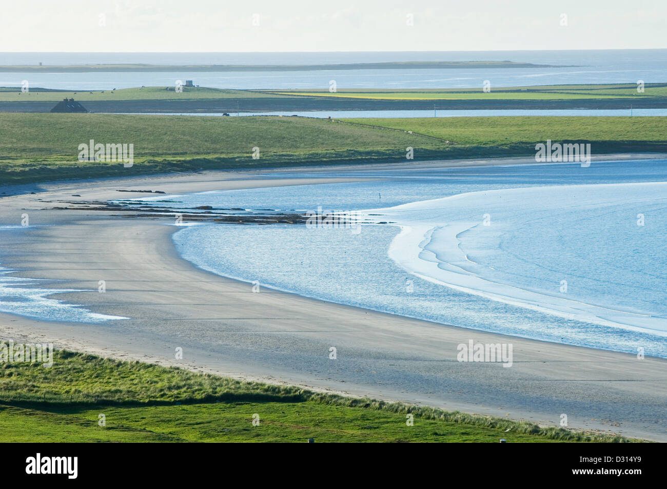 Sandy bay at the south end of the island of Sanday, near the ferry terminal. Orkney Islands, Scotland. Stock Photo