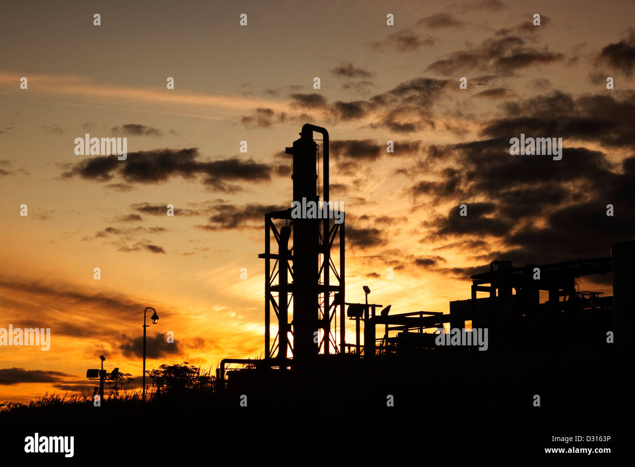 Industrial silhouette of Glaxo Smith Kline processing plant, Montrose, Scotland Stock Photo