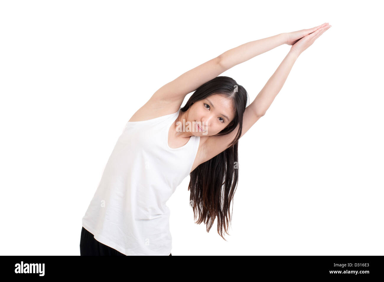Chinese woman doing yoga Stock Photo