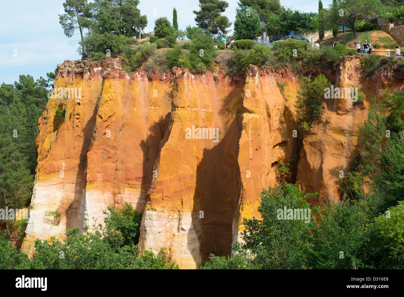 Luberon Roussillon green hilltop historic medival ochre window red rock Stock Photo