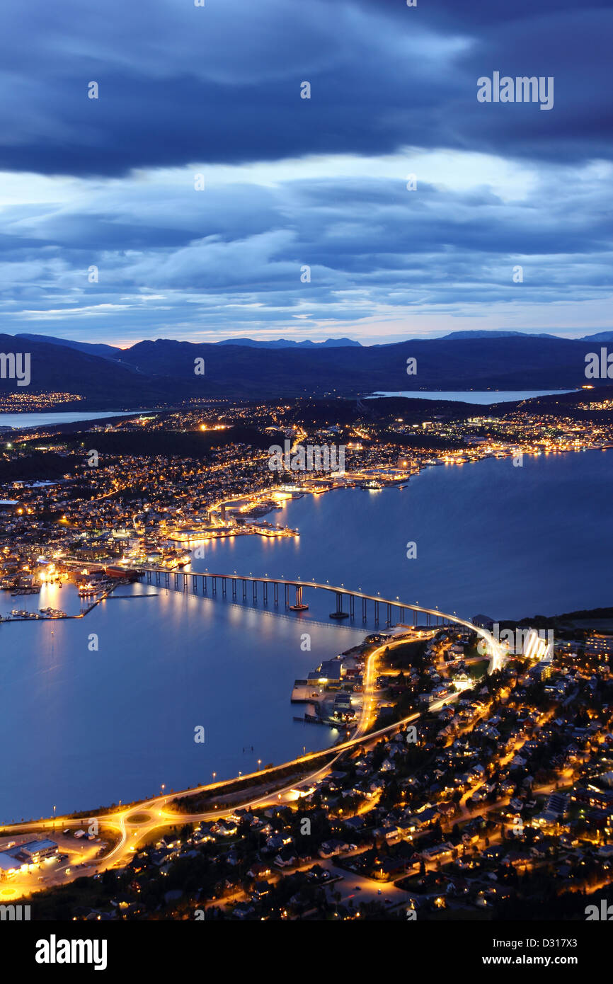 Aerial view over Tromso Bridge - linking the mainland (Tromsdalen) with the city central island (Tromsøya) Stock Photo
