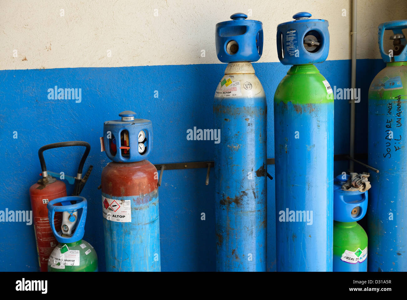 Soldering gas bottles, at garage Stock Photo Alamy