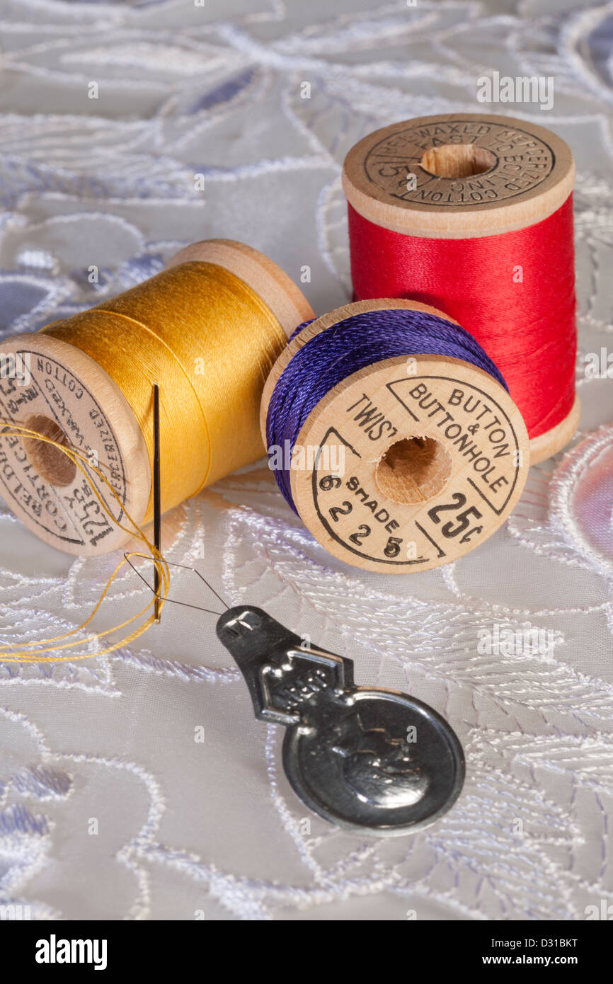 Still Life of Vintage Wooden Spools of Thread and Sewing Notions