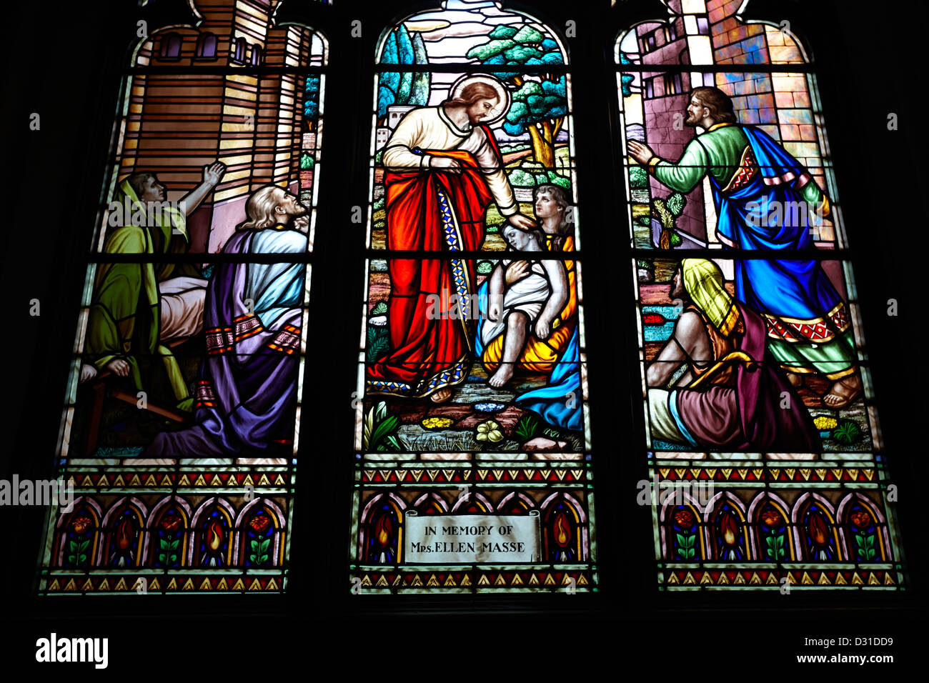 jesus healing the sick stained glass window in holy rosary cathedral Vancouver BC Canada metropolitan cathedral of our lady of the holy rosary Stock Photo