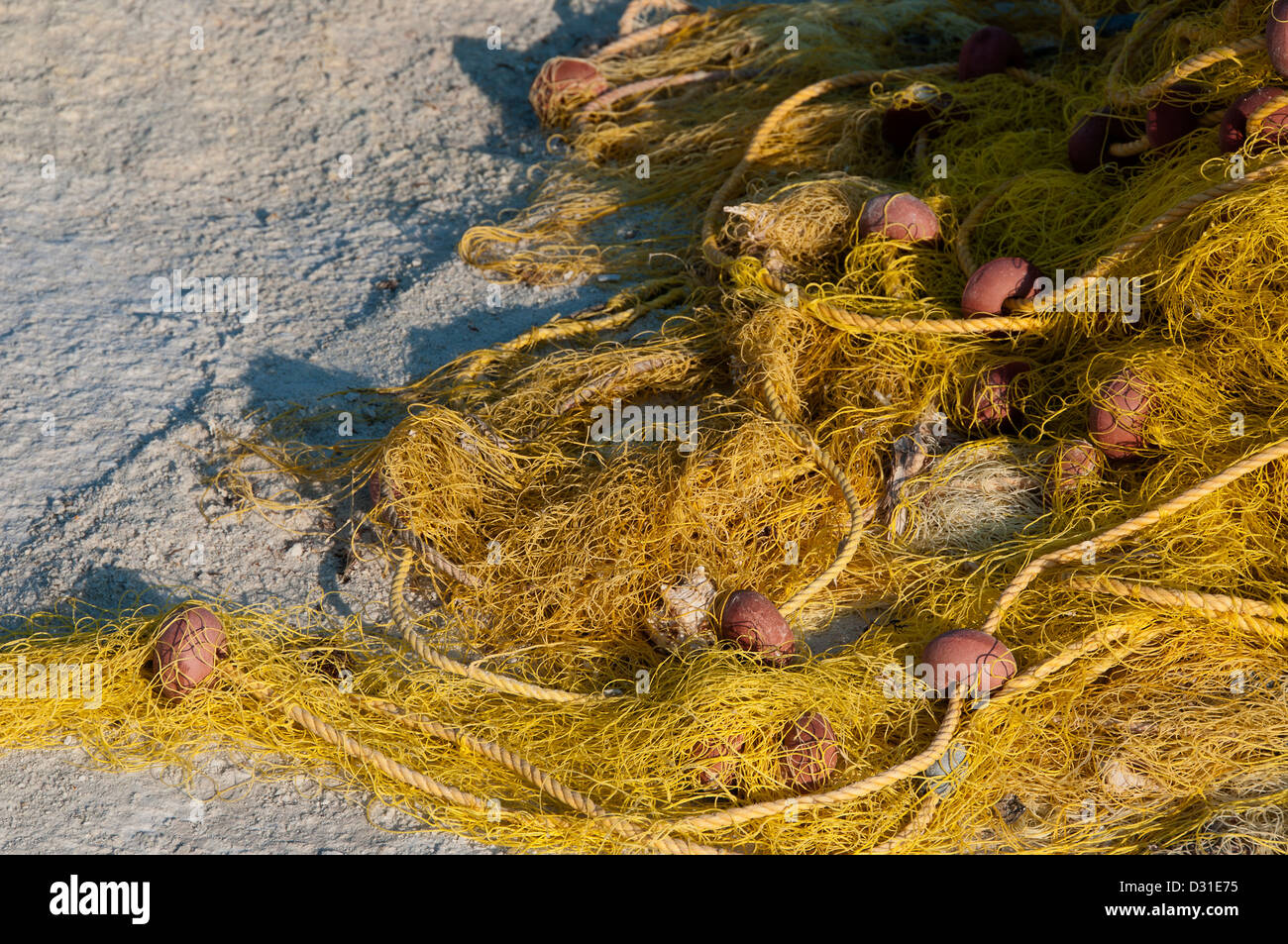 Fishing nets left in the sun to dry. Stock Photo