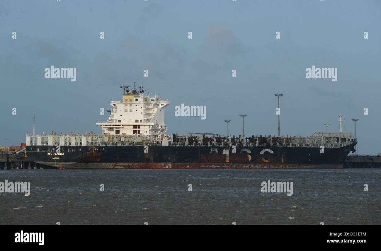 The ship 'Flaminia' is situated in the Jade-Weser Port in Wilhelmshaven, Germany, 04 February 2013. The departure of the burned out container ship keeps being delayed. The NSB shipping company in Buxtehude was planning to bring the ship to a shipyard in Romania. Photo: Carmen Jaspersen Stock Photo