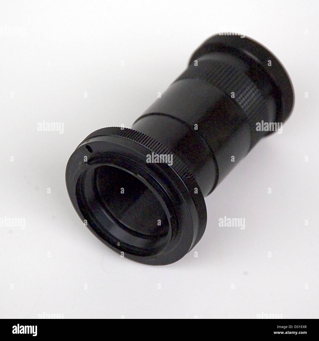 A T-adapter designed for securely attaching a telescope to a camera for ...