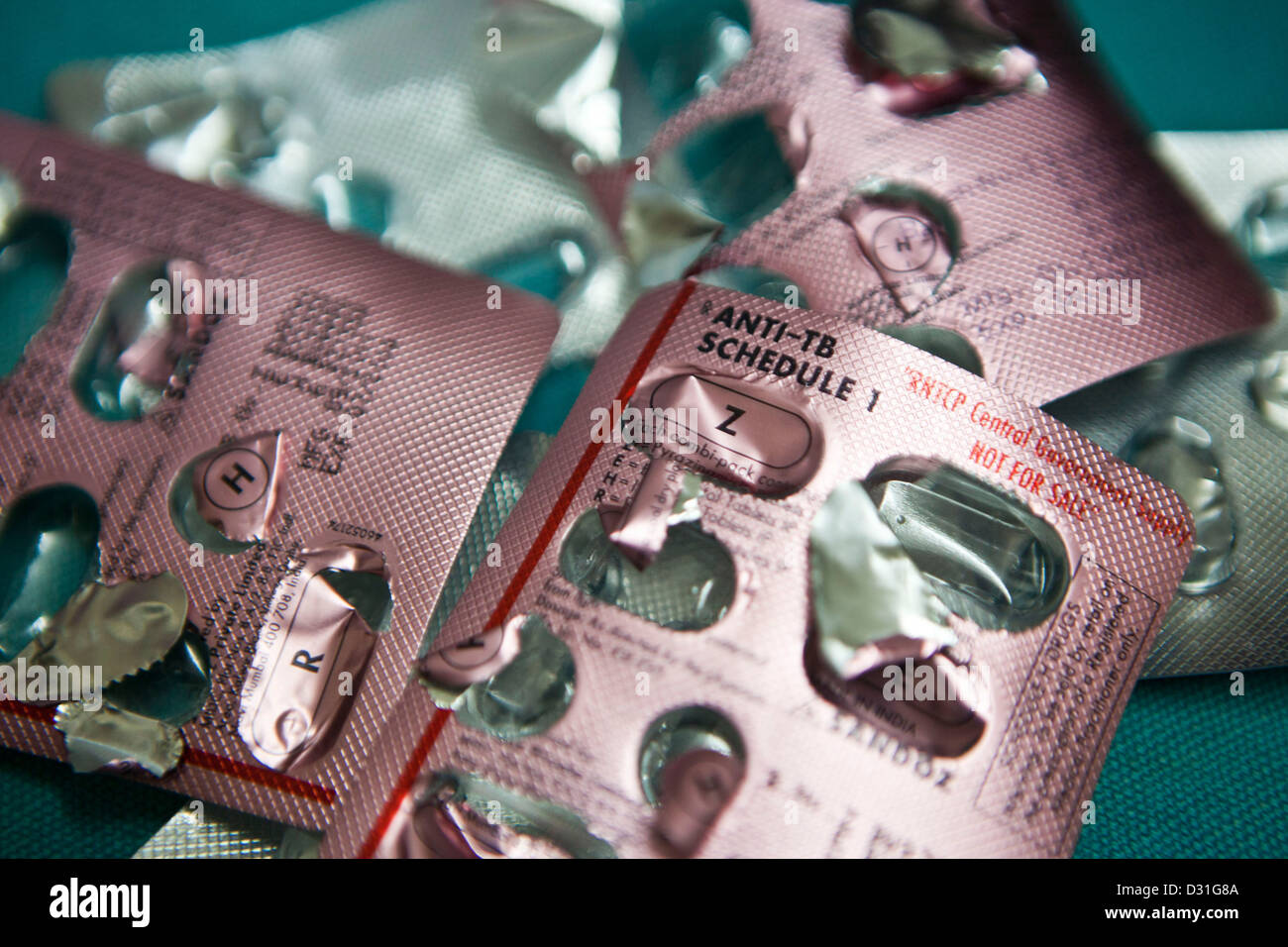 Empty blister-packs of patients Tuberculosis (TB) daily medication in a health clinic in Delhi, India. Stock Photo