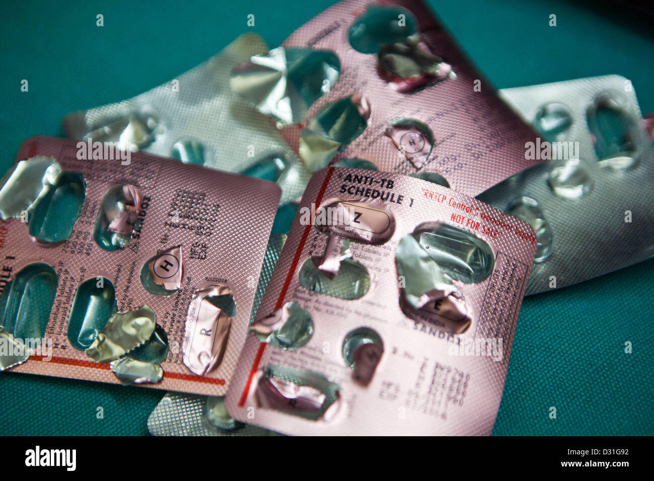 Empty blister-packs of patients Tuberculosis (TB) daily medication in a health clinic in Delhi, India. Stock Photo
