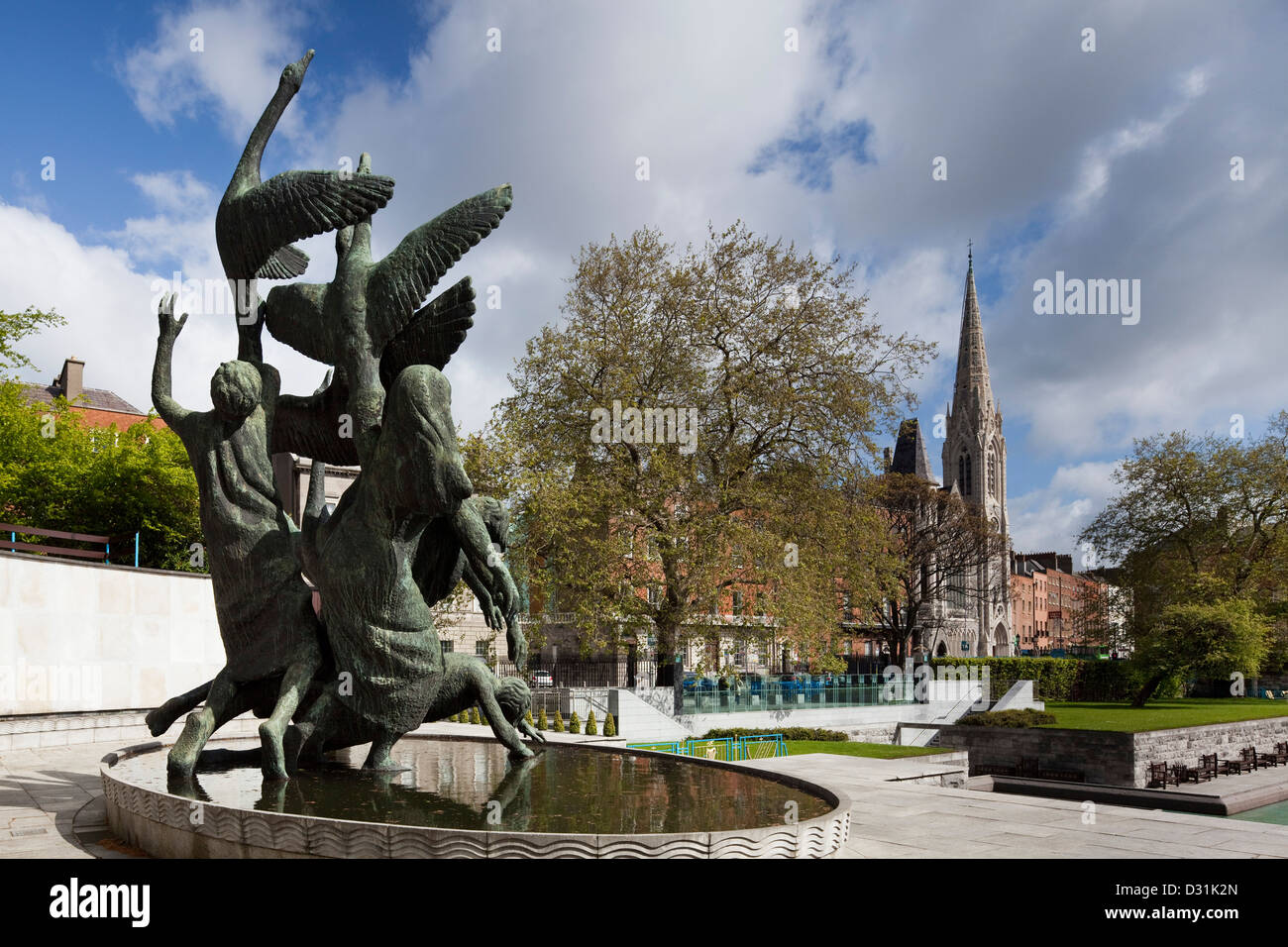 Children of Lir statue at the Garden of Remembrance, Dublin with trees