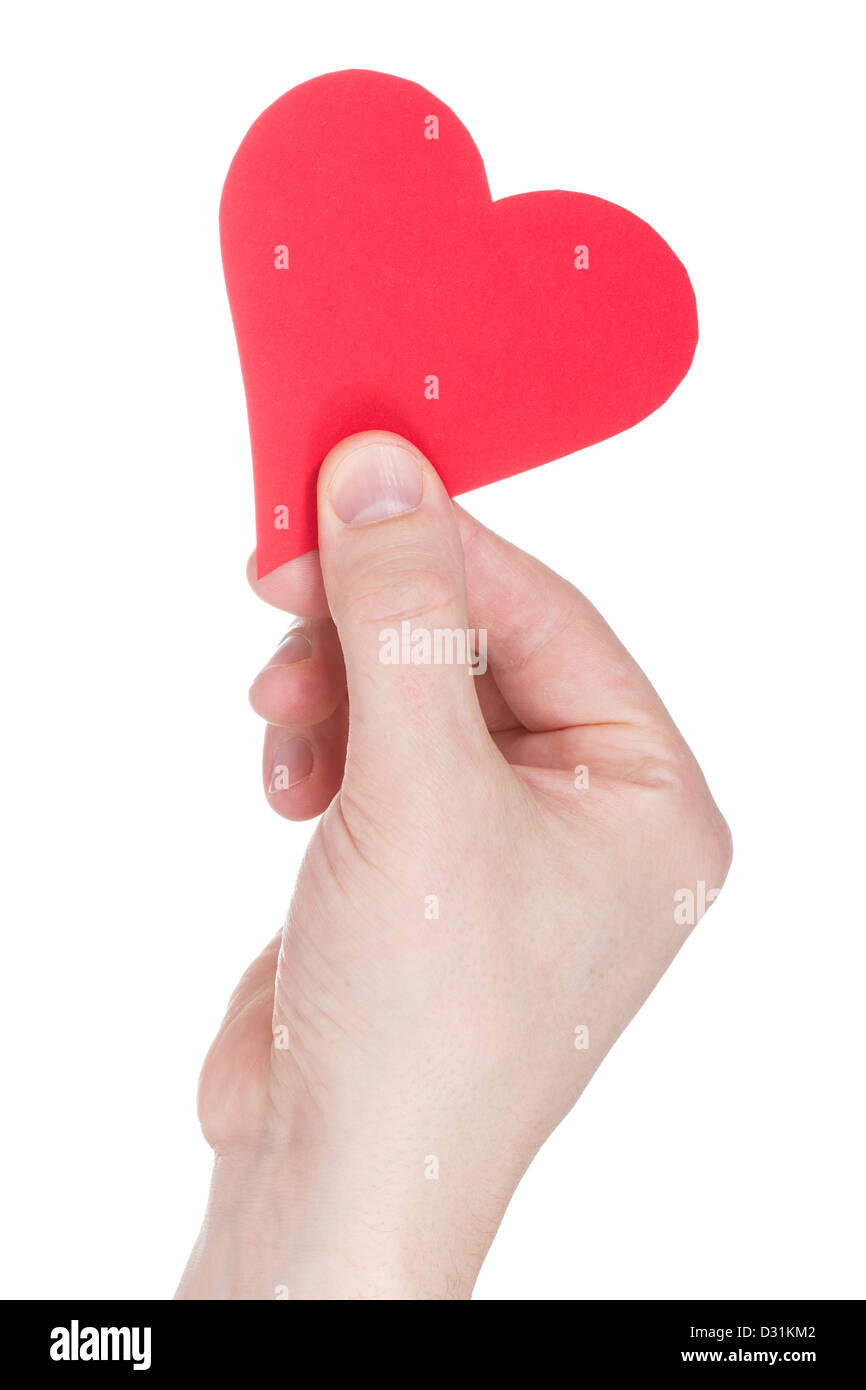 holding a red heart in hand, isolated on white background Stock Photo ...