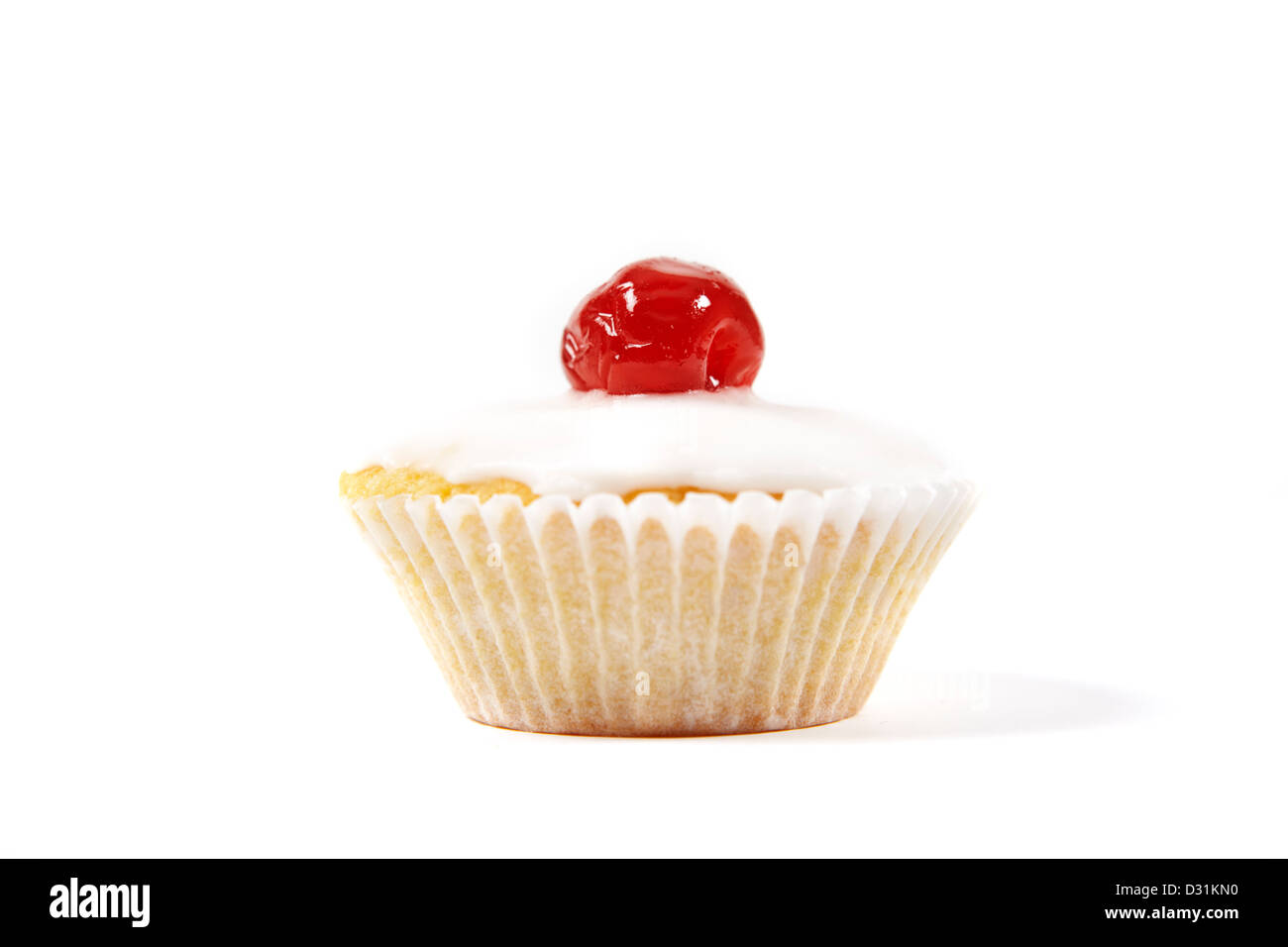 Iced cupcake with a cherry on top Stock Photo