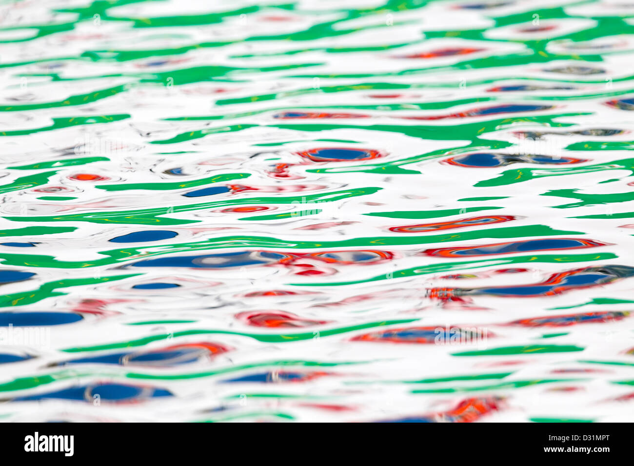 Colour Patterns on the Sea; Reflection from Boat; Newlyn; Cornwall; Stock Photo