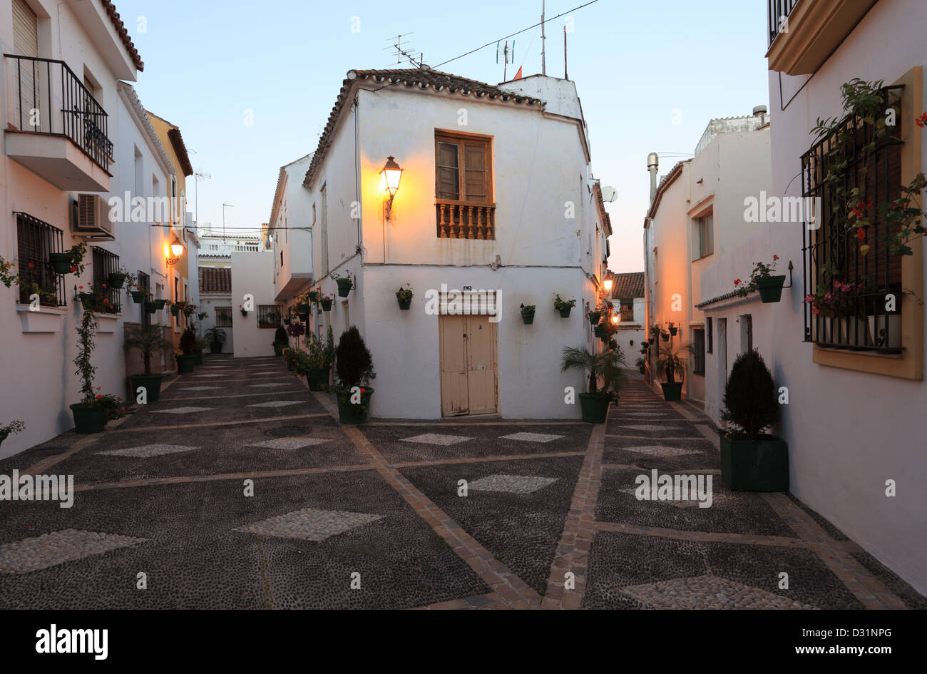 Street in spanish town Estepona at dusk, Andalusia, Spain Stock Photo