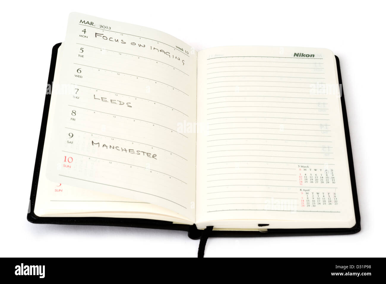 Dates marked in pocket diary Stock Photo