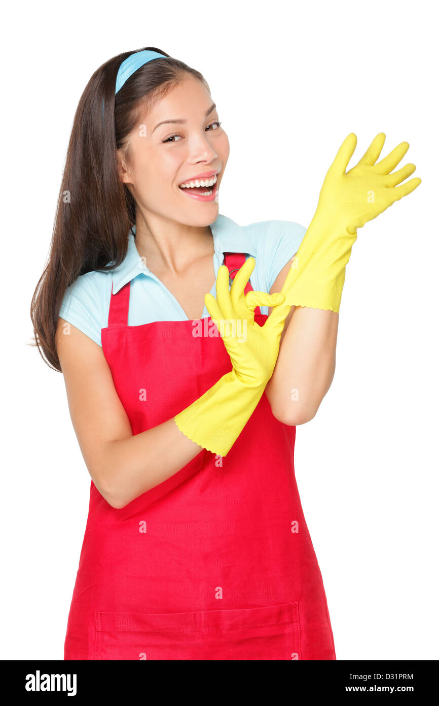 Portrait of young Asian cleaning woman getting ready putting on rubber gloves isolated on white background Stock Photo