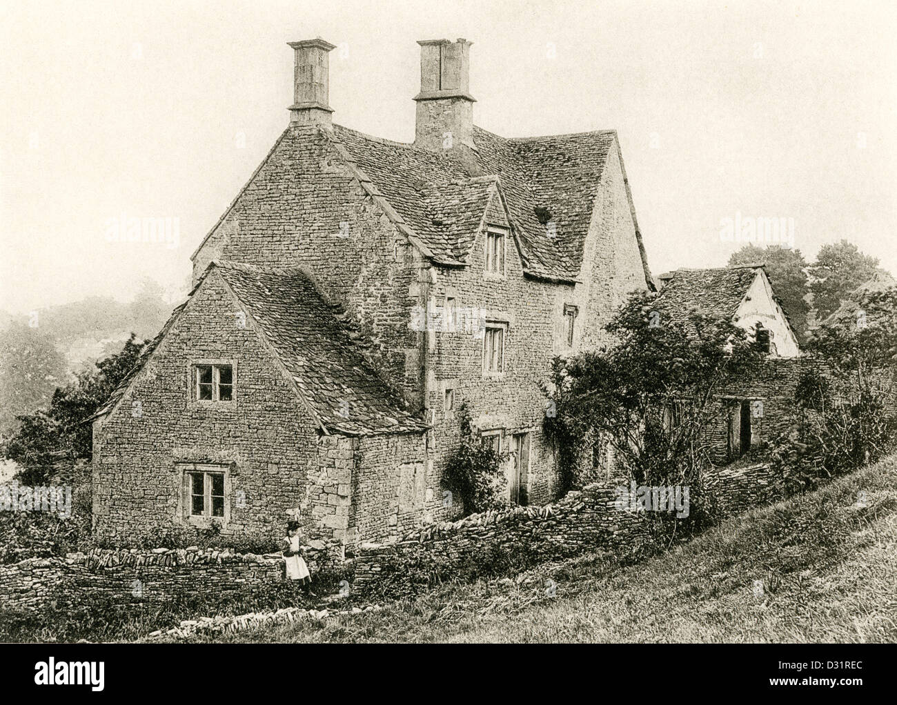 A collotype plate entitled ' Cottages at Chedworth, Glos.' scanned at high resolution from a book published in 1905. Stock Photo