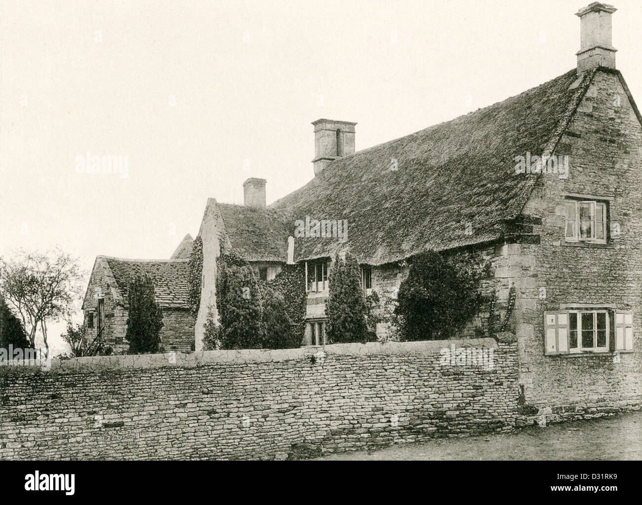 A collotype plate entitled ' A Farmhouse at Gretton, Northants.' from a book published in 1905. Stock Photo