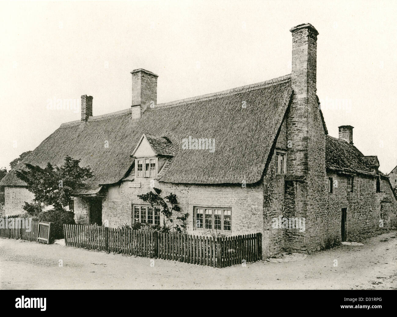 A collotype plate entitled ' The Post Office, Ducklington, Oxon.' scanned at high resolution from a book published in 1905. Stock Photo