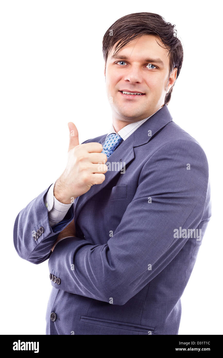 Smiling confident business man holding his thumb up isolated on white ...