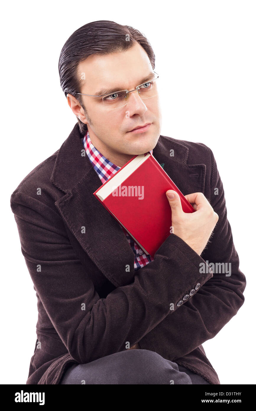 Portrait of a handsome young man holding a book on white Stock Photo ...