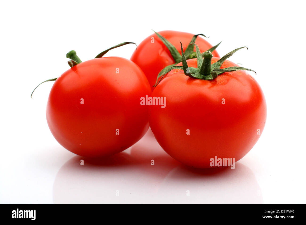 tomatos isolated on white background close up Stock Photo - Alamy