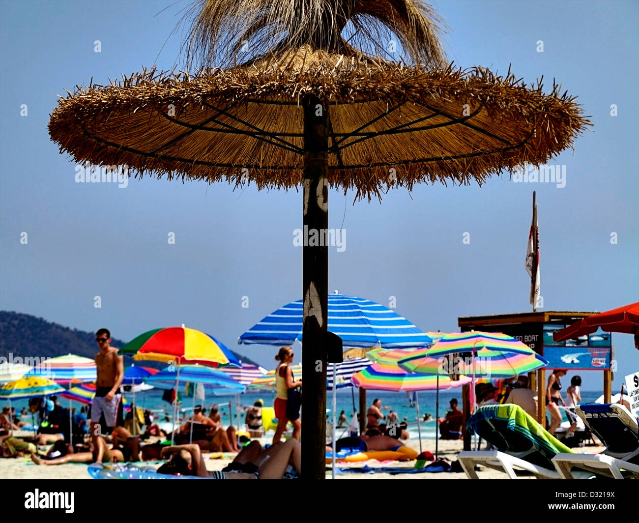 Sun parasols on the beach in the Algarve, Portugal Stock Photo