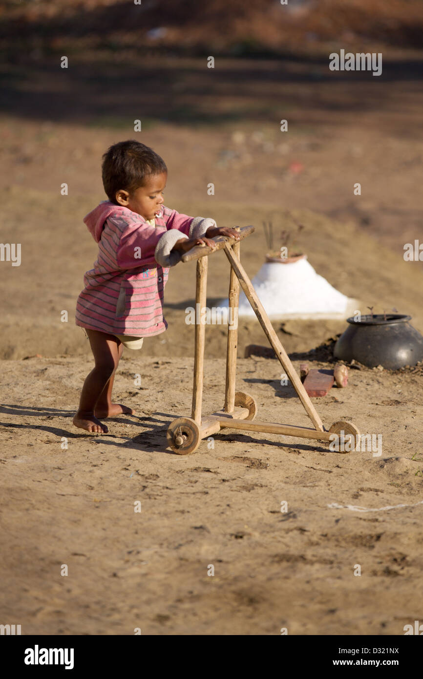 Child learning to walk Madhya Pradesh India Stock Photo